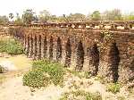 Rondreis Indochina - Een oude Khmer brug tussen Phong Peng