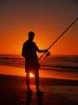 Recent bekeken:
Een visser op het strand van Sidi Ifni met de zonsondergang