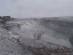 IJsland: De Gullfoss werpt het koude glesjerwater van de HvÃ­tÃ¡ (witte rivier) in twee treden 32 meter naar beneden - P2260785.jpg - Copyright : Ronald van der Veer (http://www.veeronline.nl)